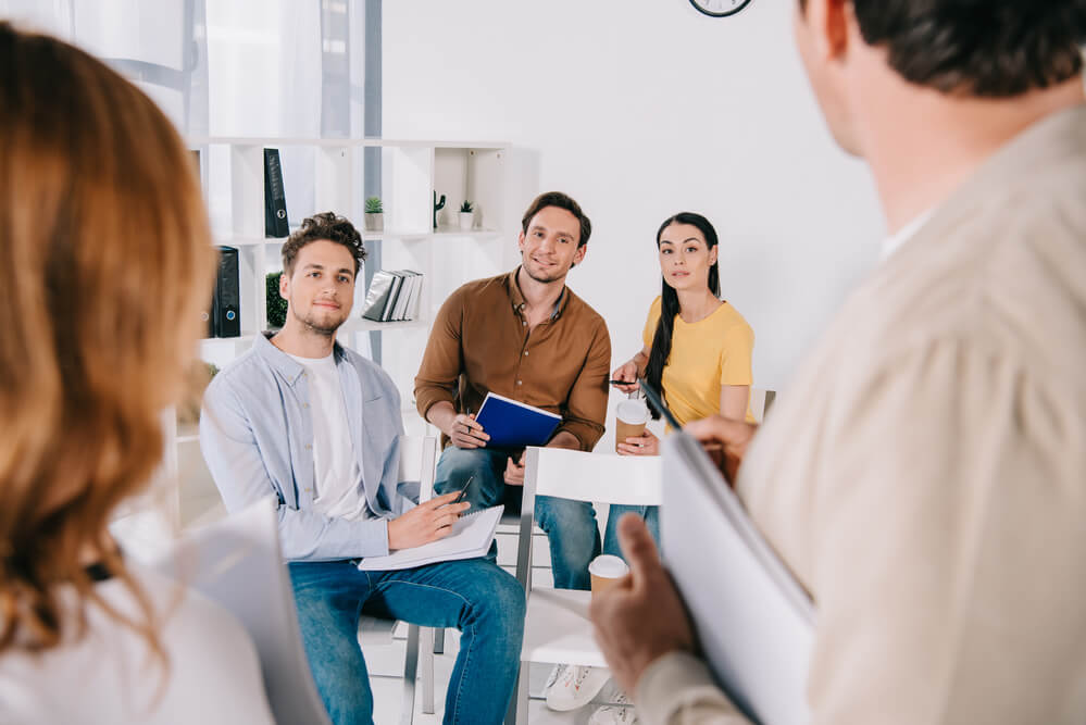 Group of people getting trained on workplace from meta