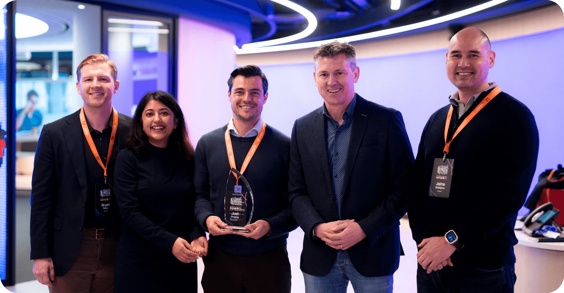 LineZero receiving Workvivo’s 2025 Global Partner of the Year Award in London, UK