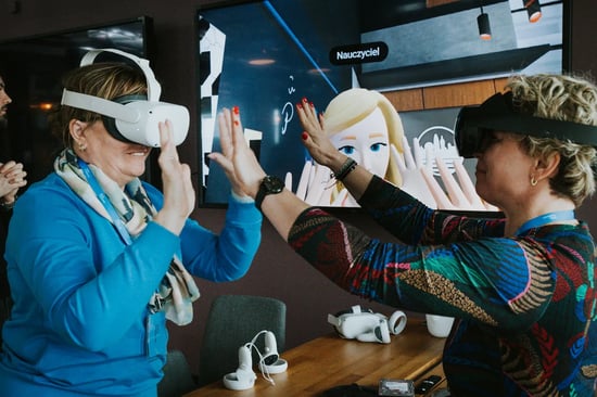 women wearing mixed reality meta quest headsets