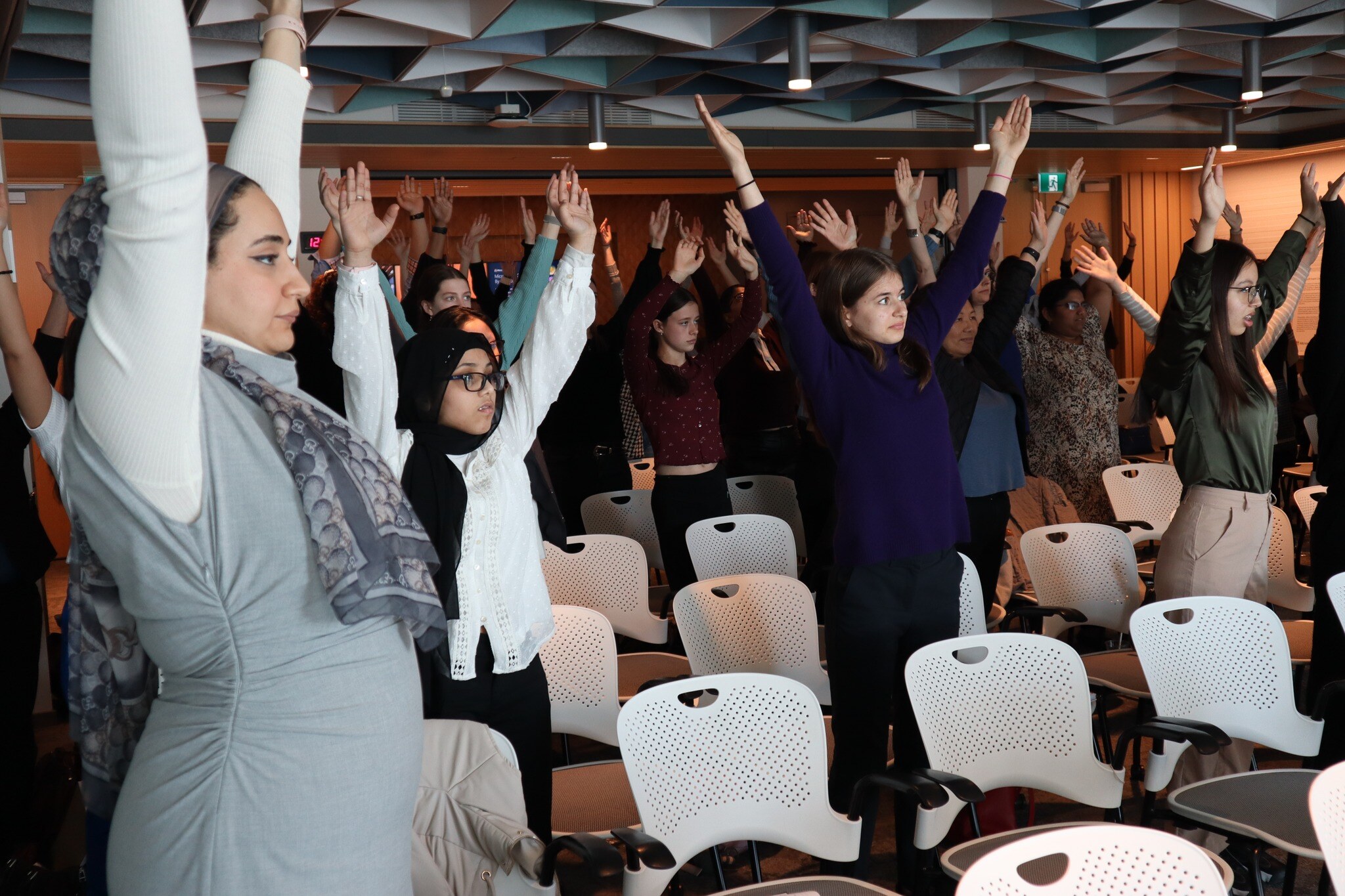 image of women gather in a group to talk about women experiences and gender equality at work