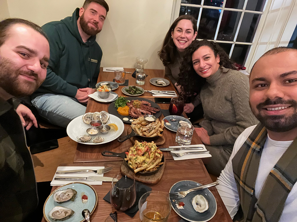 GROUP EATING DINNER